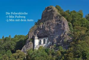 a church built into the side of a mountain at 70qm Pure Erholung in bester Lage in Idar-Oberstein