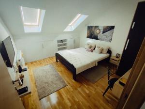 Postel nebo postele na pokoji v ubytování Apartman Blagojevic Hill