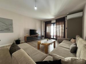 TV a/nebo společenská místnost v ubytování B2 Apartment