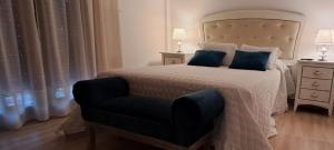 Łóżko lub łóżka w pokoju w obiekcie Casa Victoria garden con Jacuzzi y piscina