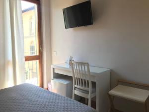 TV a/nebo společenská místnost v ubytování Gialel Pisa Guest House