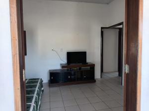 TV a/nebo společenská místnost v ubytování Casa de Praia em Ipioca - Maceió AL