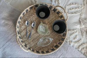 a wicker basket with spoons and aeder at Modern Studio in Palermo Hollywood in Buenos Aires