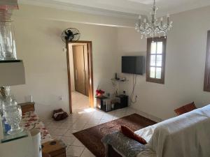 Μια τηλεόραση ή/και κέντρο ψυχαγωγίας στο Casa de Praia em Guarapari - ES
