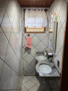 Ένα μπάνιο στο Casa de Praia em Guarapari - ES +6 φωτογραφίες