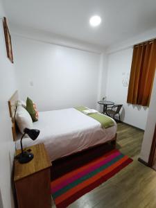 Cama o camas de una habitación en Qente Wings