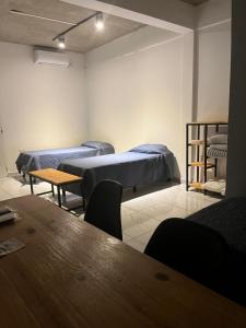 Ένα ή περισσότερα κρεβάτια σε δωμάτιο στο Don Will Apart