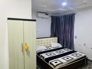 Postel nebo postele na pokoji v ubytování Olatis hotel