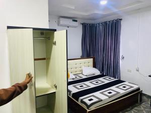 Postel nebo postele na pokoji v ubytování Olatis hotel