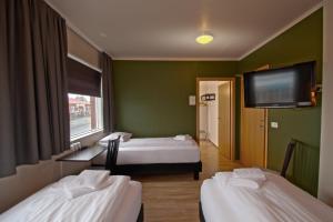 Katil atau katil-katil dalam bilik di Hotel Post