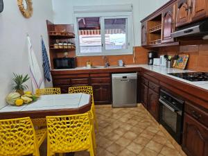 Kuchyň nebo kuchyňský kout v ubytování Maison la Casa Créole, spa, emplacement central + 26 fotografií