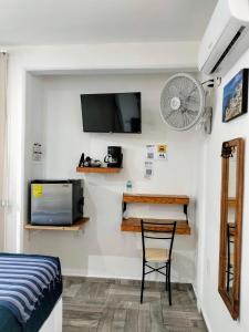 TV a/nebo společenská místnost v ubytování teki-sha home&suites + 31 fotografií