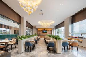 Restaurace v ubytování 广州南站番禺长隆舒与酒店
