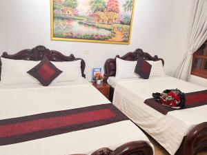 Postel nebo postele na pokoji v ubytování Fortuna Homestay