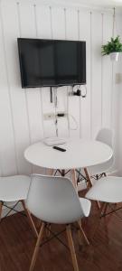 Un televizor și/sau centru de divertisment la prime residence city land staycation