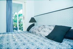 Ένα ή περισσότερα κρεβάτια σε δωμάτιο στο Villa Kaze No Toki