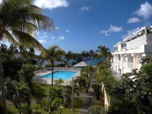 The swimming pool at or close to Condo Flamingo with pool