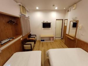 TV a/nebo společenská místnost v ubytování Long Cherng Hotel
