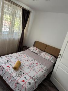 Postel nebo postele na pokoji v ubytování Apartament 4 camere Orsova + 5 fotografií