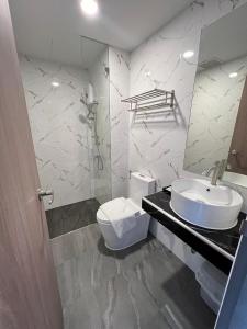 Koupelna v ubytování เวลโกรว์ โฮเทล - Wellgrow Hotel