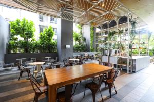 Restoran või mõni muu söögikoht majutusasutuses Ceylonz Suites by MyKey