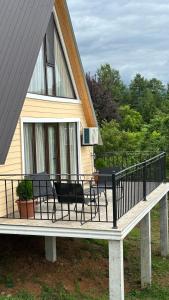 Balkón nebo terasa v ubytování Cozy Cottages Kondidi