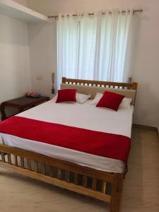 Mundro Garden Homestay客房内的一张或多张床位