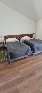 Postel nebo postele na pokoji v ubytování Guest House Shina
