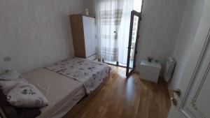 Postel nebo postele na pokoji v ubytování Banu House