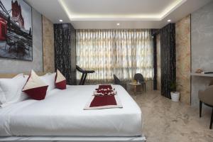 Giường trong phòng chung tại Hotel Robot
