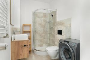 Kúpeľňa v ubytovaní Przestronny Apartament Blisko Jeziora w Poznaniu 2 Miejsca Postojowe by Noclegi Renters