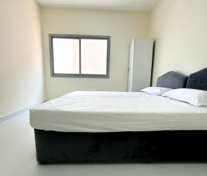 Postel nebo postele na pokoji v ubytování Baraha Star Residence
