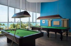 Biliár nebo kulečník v ubytování Movenpick Luxury Residence Pattaya-by Noah
