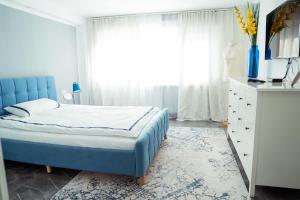 Katil atau katil-katil dalam bilik di Ferienhaus - Ruheoase Kassel