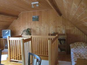A bed or beds in a room at Bozsoki Pihenő