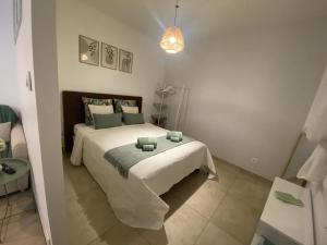 Giường trong phòng chung tại Étape Chalon Autoroute