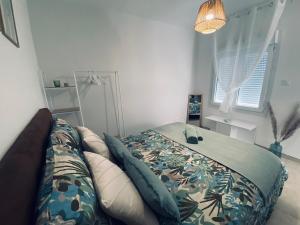 Giường trong phòng chung tại Étape Chalon Autoroute