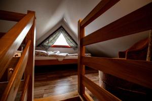 Łóżko lub łóżka w pokoju w obiekcie Apartament nad Potokiem Sauna, Jacuzzi, SPA