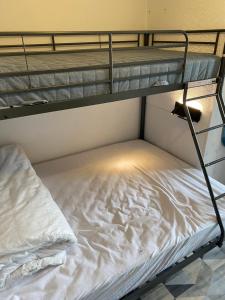 Postel nebo postele na pokoji v ubytování Les Balcons d'Edelweiss