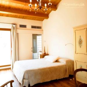 Posteľ alebo postele v izbe v ubytovaní Ca l' Ermitanyo- Casa Torre Blanca