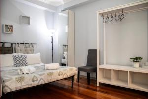 A bed or beds in a room at Dulcis Home Montemario