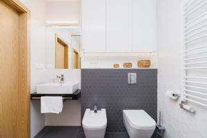 Kúpeľňa v ubytovaní Apartamenty Szóstka Wisła Kamienna