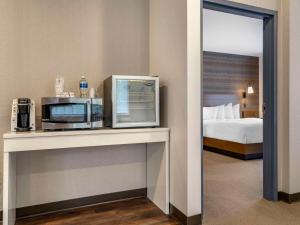 The Cranberry, Ascend Hotel Collection客房内的一张或多张床位