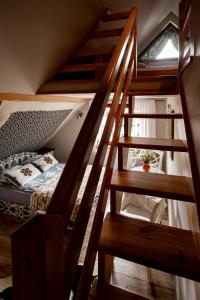 Łóżko lub łóżka w pokoju w obiekcie Apartament nad Potokiem Sauna, Jacuzzi, SPA