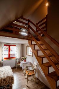 Łóżko lub łóżka w pokoju w obiekcie Apartament nad Potokiem Sauna, Jacuzzi, SPA