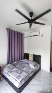 Postel nebo postele na pokoji v ubytování D'SQ Homestay