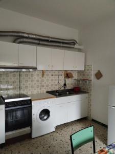 Η κουζίνα ή μικρή κουζίνα στο Grande Appartamento in montagna +25 φωτογραφίες