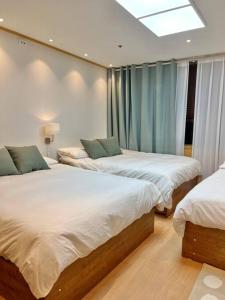 Krevet ili kreveti u jedinici u objektu Hongdae House