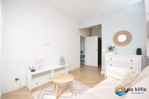 Postel nebo postele na pokoji v ubytování Apartament na klifie - Łukęcin