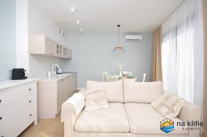 Kuchyň nebo kuchyňský kout v ubytování Apartament na klifie - Łukęcin